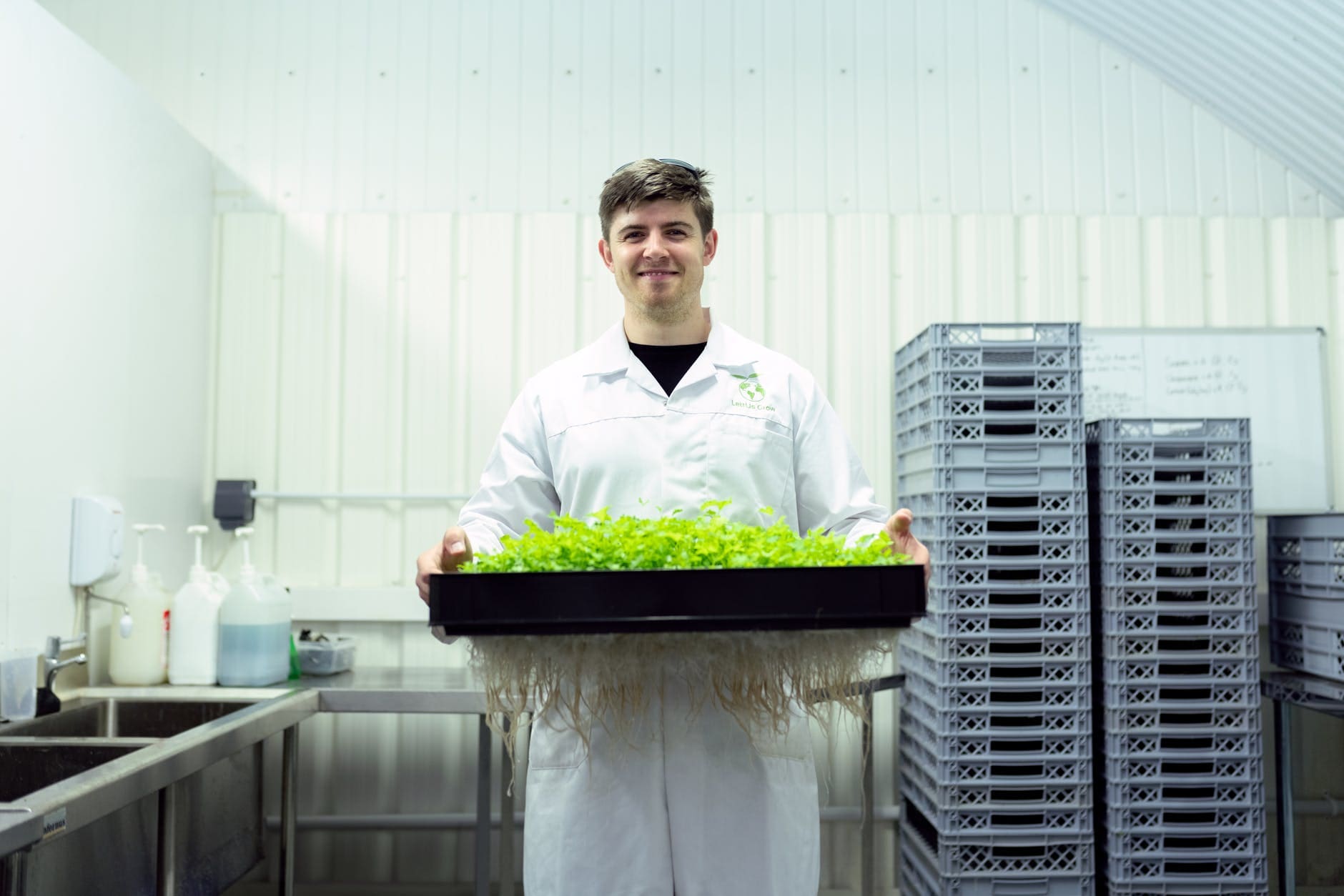 scientist holding crops in laboratory | more organic choices 